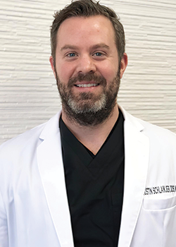 Dr. Justin Schlaikjer